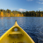 kayaking on water in the fall