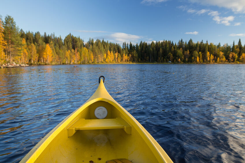 kayaking on water in the fall