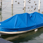 boat with blue cover