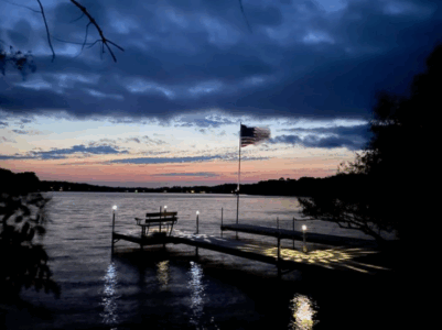 Photo 13 Vdock with Flag Pole under the sunset
