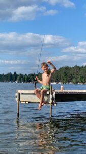 Photo 74 Boy Fishing on a VDock